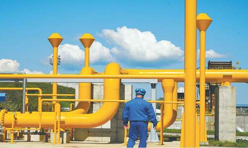EU agrees to curb gas use as Russia squeezes supply