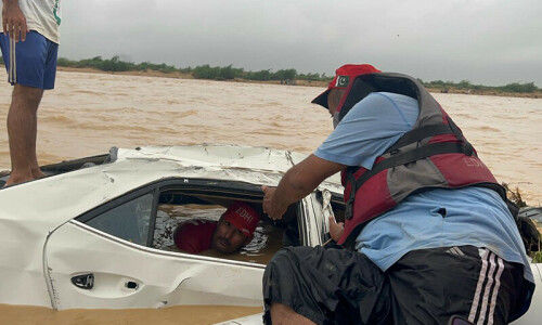 2 children dead, 5 missing after car swept away by flash flood into Karachi's Malir River 2 children dead, 5 missing after car swept away by flash flood into Karachi's Malir River