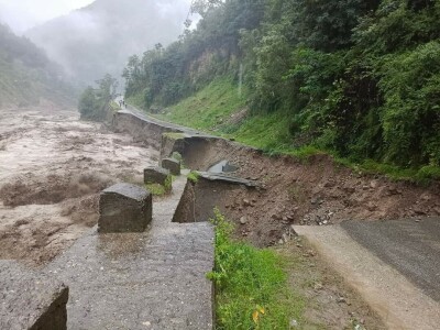 Roads swept away by flash floods in Shangla. — Photo by Umar Bacha