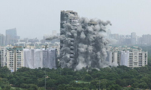 Plumes of dust as India demolishes illegal skyscrapers