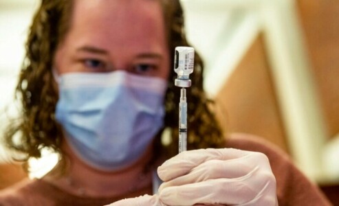 US approves updated Pfizer, Moderna shots targeting Omicron