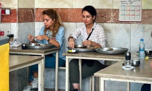 Iran arrests woman for eating out without hijab: sister Iran arrests woman for eating out without hijab: sister