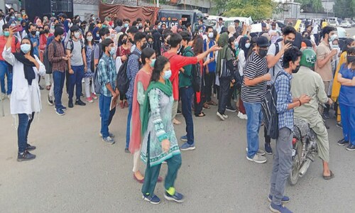 Teacher suspended after protest against harassment