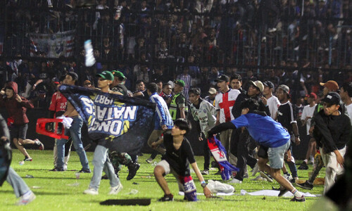 Death toll from Indonesian football stampede revised down to 125
