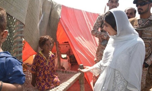 Malala interacts with flood-hit women and children in Sindh’s Johi