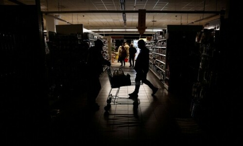 Ukrainians endure blackouts as power curbs follow Russian air strikes