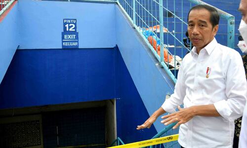 Widodo says locked doors, steep stairs caused Indonesia stadium stampede