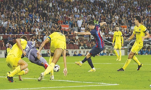 Lewandowski double as Barcelona ease past Villarreal