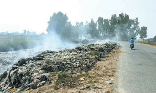 Fire at illegal landfill site disrupts traffic, causes pollution Fire at illegal landfill site disrupts traffic, causes pollution