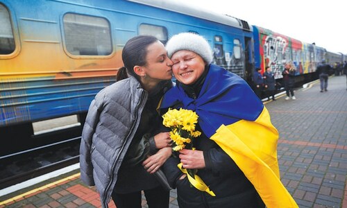 Ukrainian families reunite as Kherson train station reopens