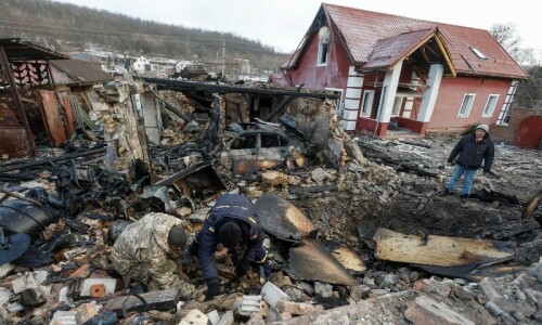 Russian &lsquo;kamikaze&rsquo; drones hit Kyiv as Putin arrives in ally Belarus