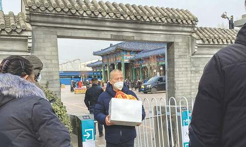 Crematoriums packed in China as Covid cases soar