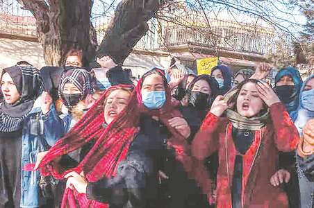 Women take to streets in Kabul over university ban