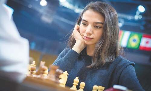 Iranian woman competes at chess tournament without hijab Iranian woman competes at chess tournament without hijab