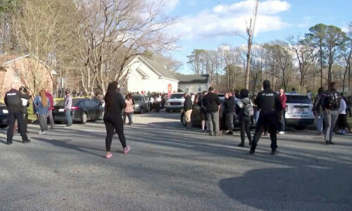 Six-year-old boy held after shooting teacher in US state of Virginia
