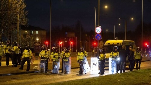 Three arrested after clashes outside UK migrant hotel