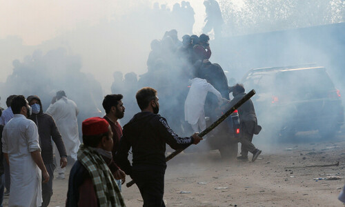 PTI, police use tear gas against each other outside Federal Judicial Complex