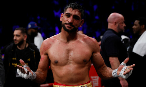 Former boxing world champion Amir Khan handed 2-year ban for doping Former boxing world champion Amir Khan handed 2-year ban for doping
