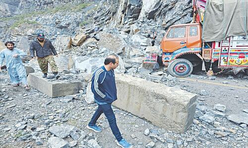 Two killed, highway blocked after heavy rains, landslides