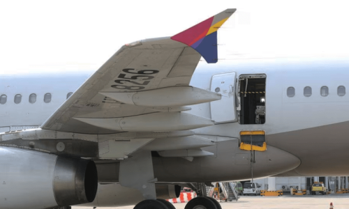 Passenger detained in S. Korea after opening plane door mid-air Passenger detained in S. Korea after opening plane door mid-air