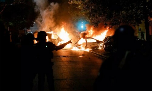 France urges calm as dozens arrested after police shooting