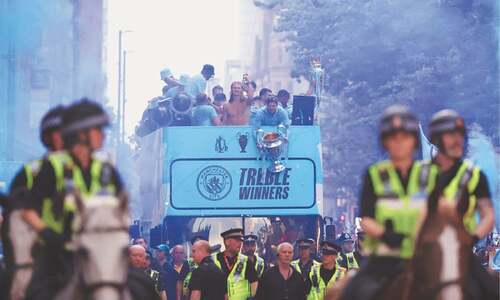 City dance in the rain to celebrate treble