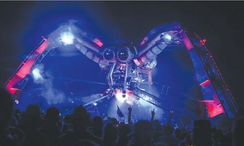 Spider made from recycled military hardware breathes fire at UK festival