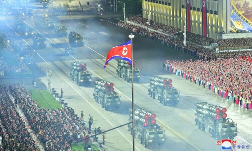 Kim oversees North Korea military parade showcasing new drones, ICBMs