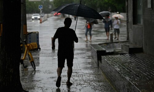 Tens of thousands evacuated as northern China hit by torrential rain