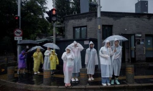 Beijing on alert with 2 killed as heavy rain batters north China Beijing on alert with 2 killed as heavy rain batters north China