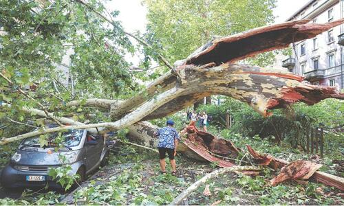 Storms kill three in Italy; fires near airport