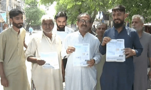 Caretakers call for &lsquo;crisis session&rsquo; as protests against inflated power bills spiral