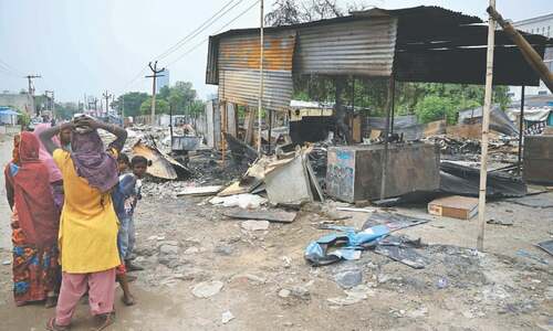 Houses razed, mosques shut after riots in India