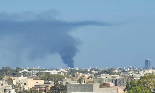 Clashes in Libyan capital kill two, shut airport