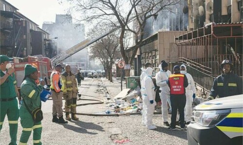 Fire in illegal housing block kills 74 in South Africa