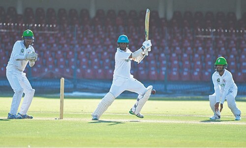 Sarfraz, Asad tons put Karachi Whites on top