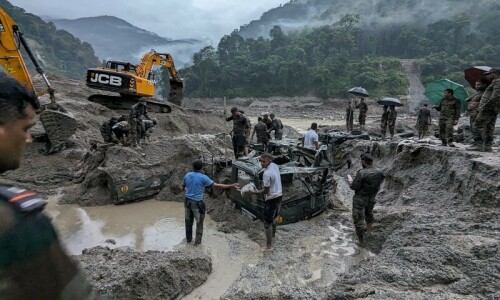 At least 14 dead, 102 missing in India glacial lake burst
