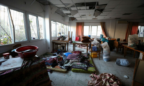 In pictures: Hospital strike in Gaza kills at least 500 Palestinians