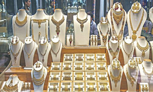 Crackdown, rising rupee take sparkle off gold prices Crackdown, rising rupee take sparkle off gold prices