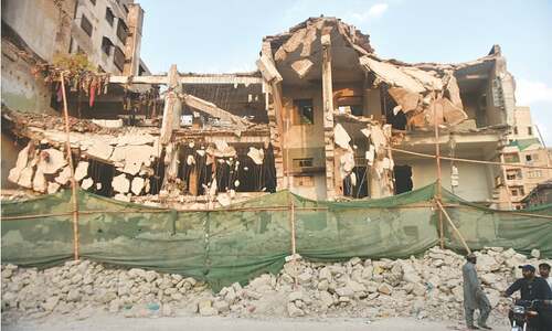 Sindh govt seals remains of partially flattened heritage building in Karachi