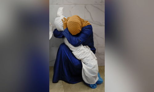 In pictures: Grief in Gaza and the loss of a child In pictures: Grief in Gaza and the loss of a child