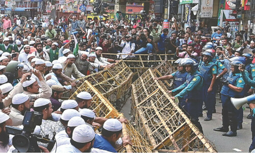 Bangladesh sets election for Jan 7 amid violent protests