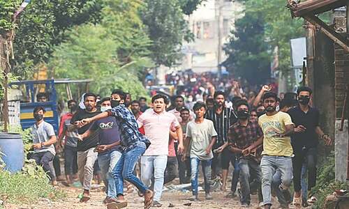 Bangladesh garment workers clash with police as factories reopen