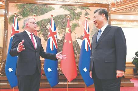 China, Australia agree &lsquo;to turn the page&rsquo; as tensions ease