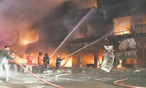 Three die as fire rips through another shopping mall in Karachi