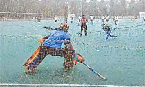 Crossing gender boundaries, girl hockey players in Lahore play along with boys
