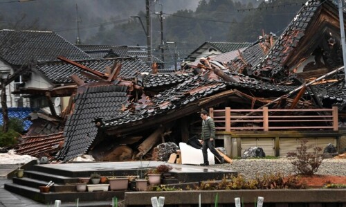 Japan quake toll rises to 62 as weather hampers rescuers