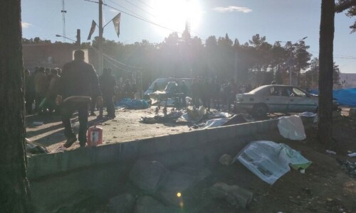 Blasts kill over 100 at ceremony to mark death of Iranian Guards commander Blasts kill over 100 at ceremony to mark death of Iranian Guards commander