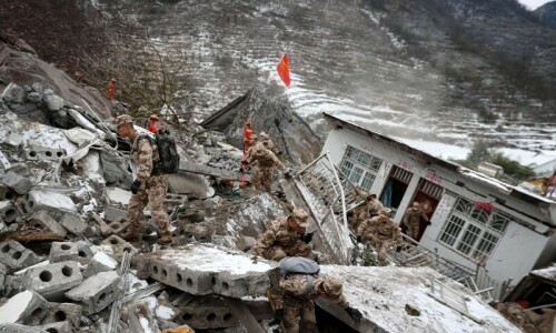 Dozens buried, 8 killed in southwest China landslide