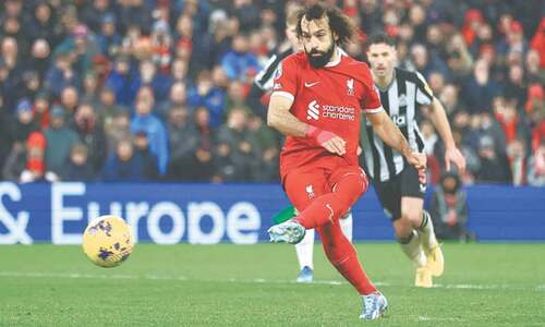 Salah scores twice as Liverpool move three points clear atop EPL